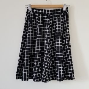 Pleated aline skater checked knee length skirt